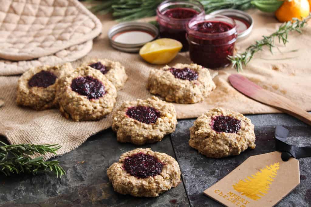 These delicious whole grain thumbprint cookies are healthy enough for breakfast and sweet enough for dessert. Perfect for holiday baking!