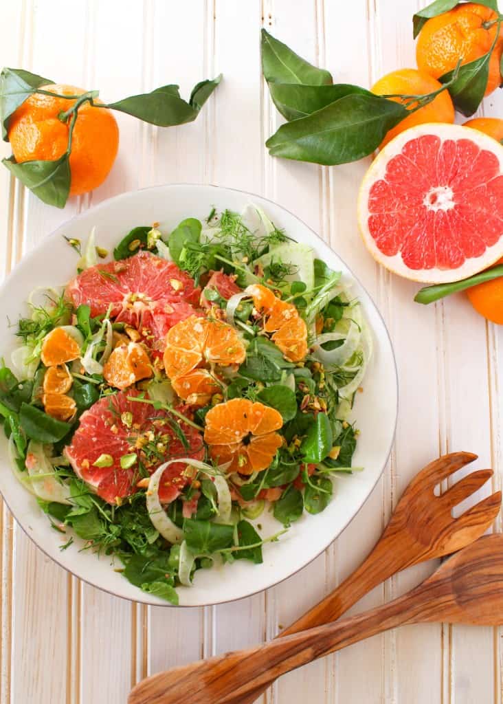 Winter Citrus Salad recipe made with grapefruit, satsuma orange, watercress, fennel, and topped with pistachios. Vegan and gluten free. The Grateful Grazer