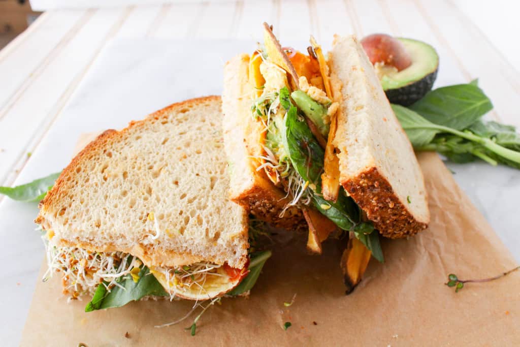 This sweet potato hummus sandwich is a convenient and transportable plant-based lunch that the entire family will love. Vegan, whole grain, and plant-based!