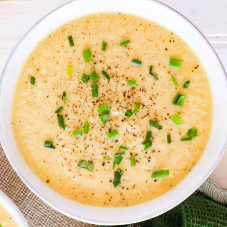 Creamy vegan potato leek soup with fresh chives.