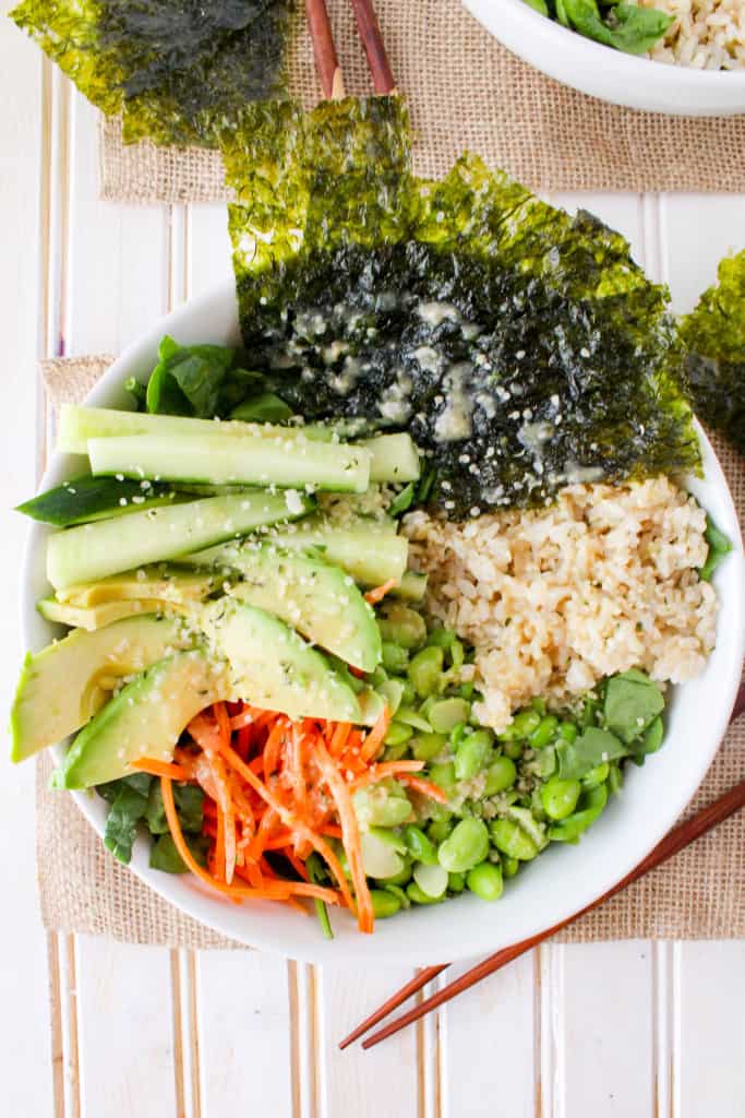 This deconstructed sushi salad is a delicious and simple healthy lunch or dinner. Served with flavorful Sesame Ginger Miso Dressing. Quick and easy recipe!