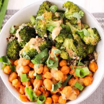 Buffalo chickpea bowl with broccoli, quinoa, and tahini sauce.