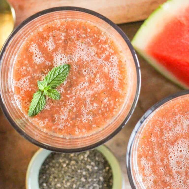 Watermelon chia seed drink (chia fresca) garnished with mint.