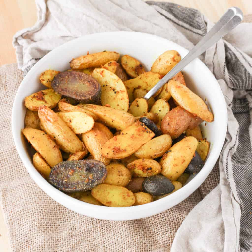 Roasted Turmeric Black Pepper Fingerling Potatoes are a simple and healthy vegan side dish! 