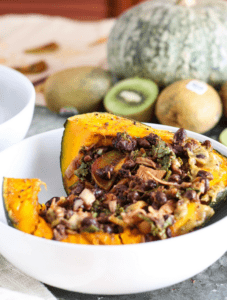 This vegan BBQ jackfruit recipe is perfect for fall/winter! Jackfruit & black beans are served in roasted kabocha squash bowls with creamy kiwi lime sauce.