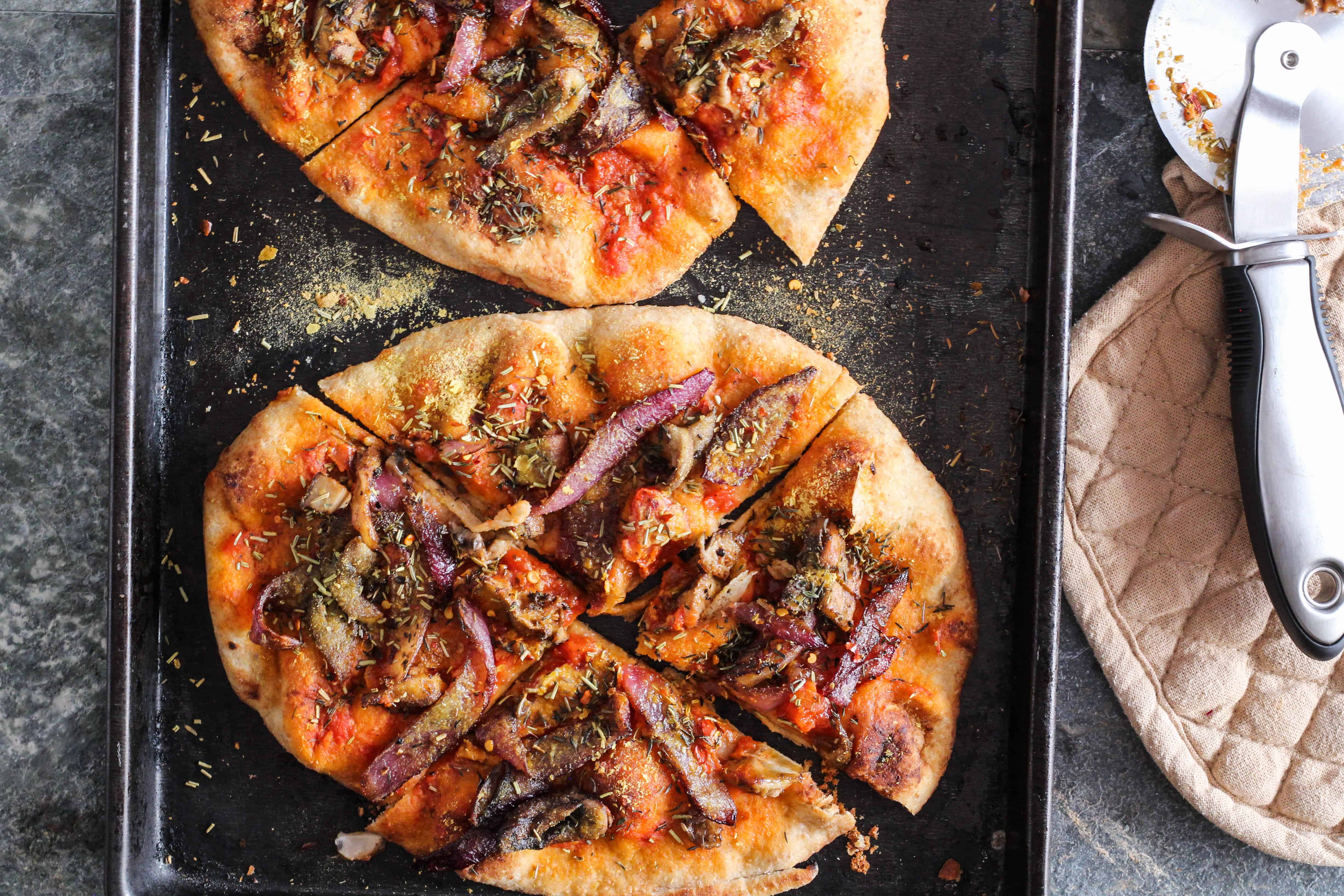 Vegan naan pizza is a healthy, fun, and delicious weeknight meal that the entire family will love. Recipe + sign up for a free plant-based cookbook!