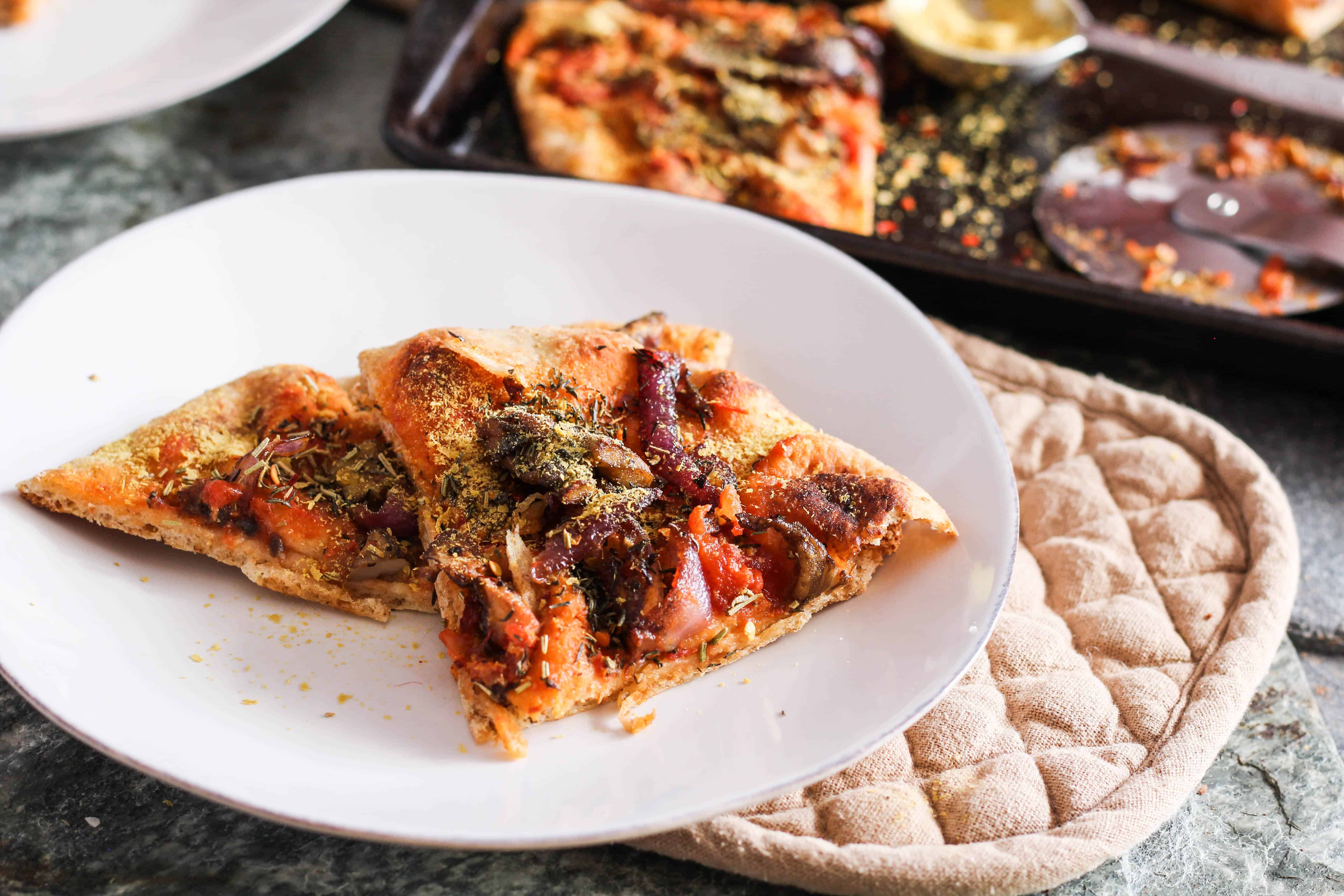 Vegan naan pizza is a healthy, fun, and delicious weeknight meal that the entire family will love. Recipe + sign up for a free plant-based cookbook!