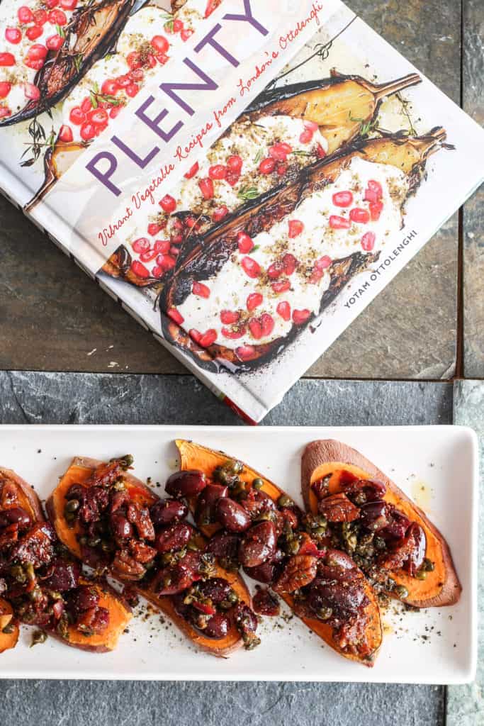 Sweet potato toast topped with a savory tapenade of olives, capers, garlic, and fresh herbs. Healthy holiday party appetizer! Vegan, Gluten-Free.