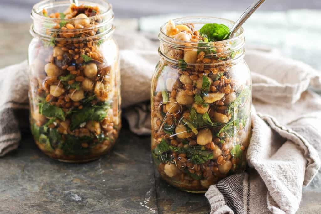 This Moroccan-inspired chickpea grain salad is flavorful, nutritious, and hearty enough to stand the test of travel. Break out of your weekday lunch rut!