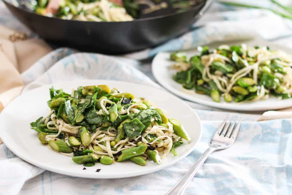 Udon Noodles with Asparagus and Greens. A quick and easy plant-based meal that can be served warm, room temperature, or cold. Great for packed lunches!