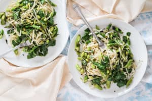 Udon Noodles with Asparagus and Greens. A quick and easy plant-based meal that can be served warm, room temperature, or cold. Great for packed lunches!