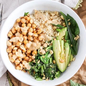 Chickpea protein bowl with greens, avocado, and peanut sauce.