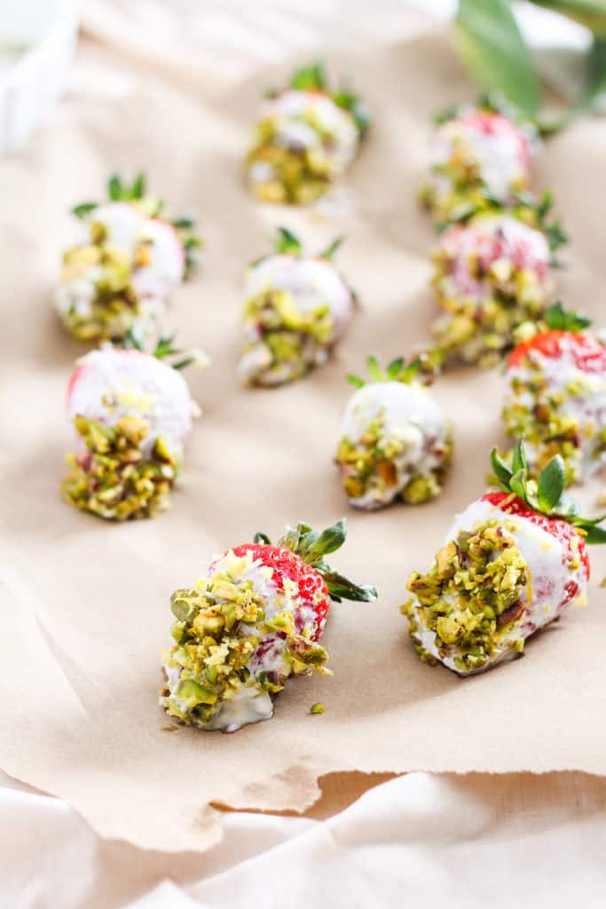 4 basic ingredients are all you need to create these deceivingly simple yogurt dipped strawberries, perfect for a quick healthy snack or impressive dessert while entertaining.