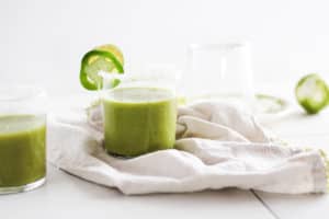 Cool off this summer with blended Mango Matcha Margaritas! Can be made as a cocktail or mocktail. Healthy and delicious green tea recipe!