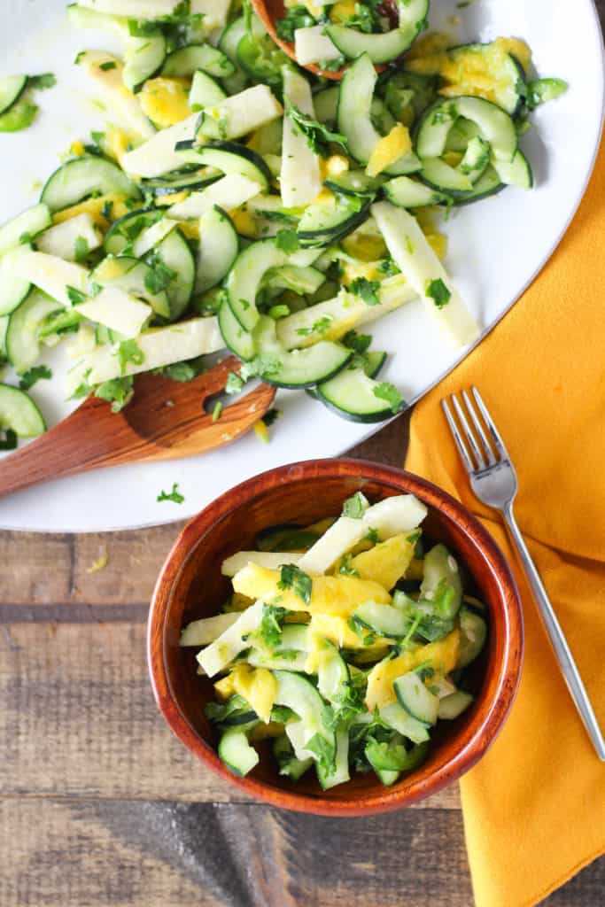 Upgrade your go-to summer fruit salad with a colorful Mango Cucumber Salad with Jicama! Easy vegan/vegetarian and gluten-free recipe!