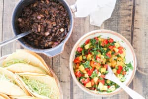 Add a little zest to your summer meals with healthy Black Bean Street Tacos topped with Tropical Fruit Salsa!