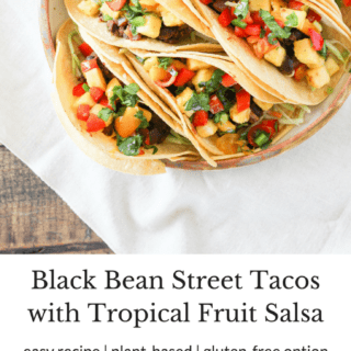 #ad Add a little zest to your summer meals with healthy Black Bean Street Tacos topped with Tropical Fruit Salsa! Vegetarian recipe with gluten-free option.