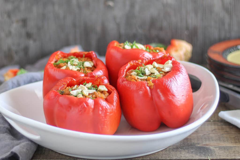 Stuffed peppers get a delicious update with the addition of lentil coconut curry. This recipe will be your favorite weeknight meal for using up leftovers!