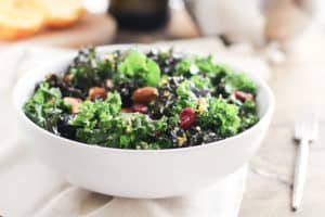 This winter salad tastes even better leftover! Make-Ahead Cranberry Orange Kale Salad recipe.