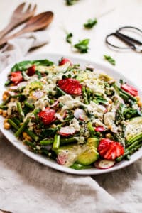 Spring farro salad. Upgrade your regular grain salad with spring vegetables and creamy, lemon tahini dressing.