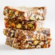 No-bake sesame date bars stacked on top of each other.