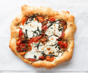 heirloom tomato pizza - a recipe featured in the Seasonal Produce Guide ebook