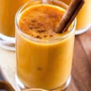 Non-alcoholic Indian-inspired yogurt lassi drink with pumpkin and cinnamon.
