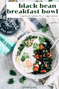 Black bean breakfast burrito bowl in white ceramic bowl with bag of oats and title text that reads, "black bean breakfast burrito bowl."