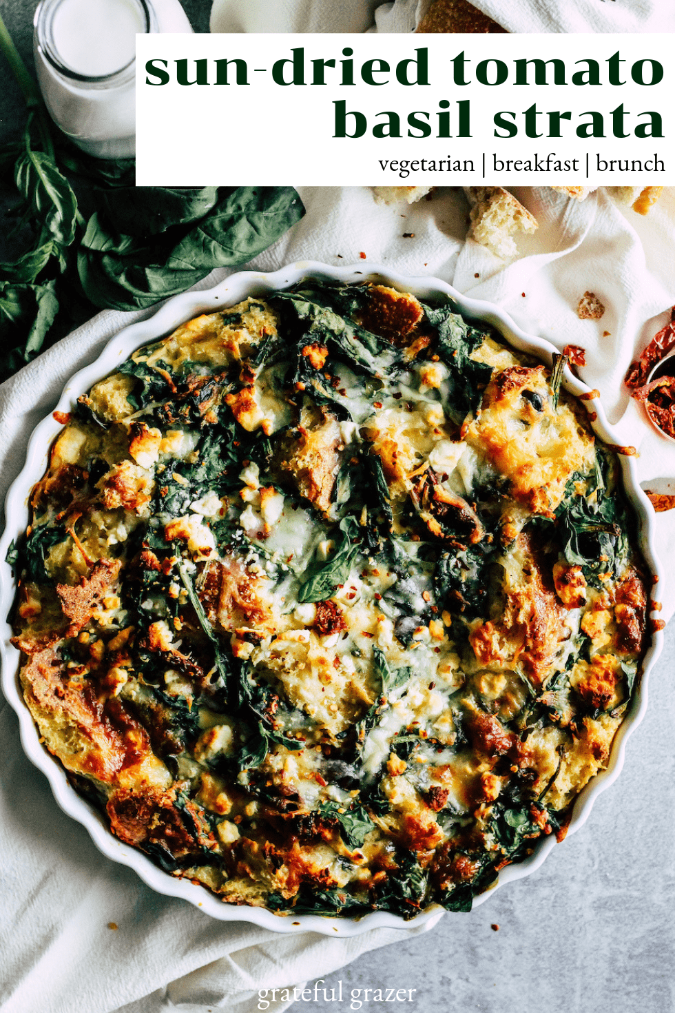 Strata in white pie dish with text that reads, "Sun-Dried Tomato Basil Strata: vegetarian, breakfast, brunch."