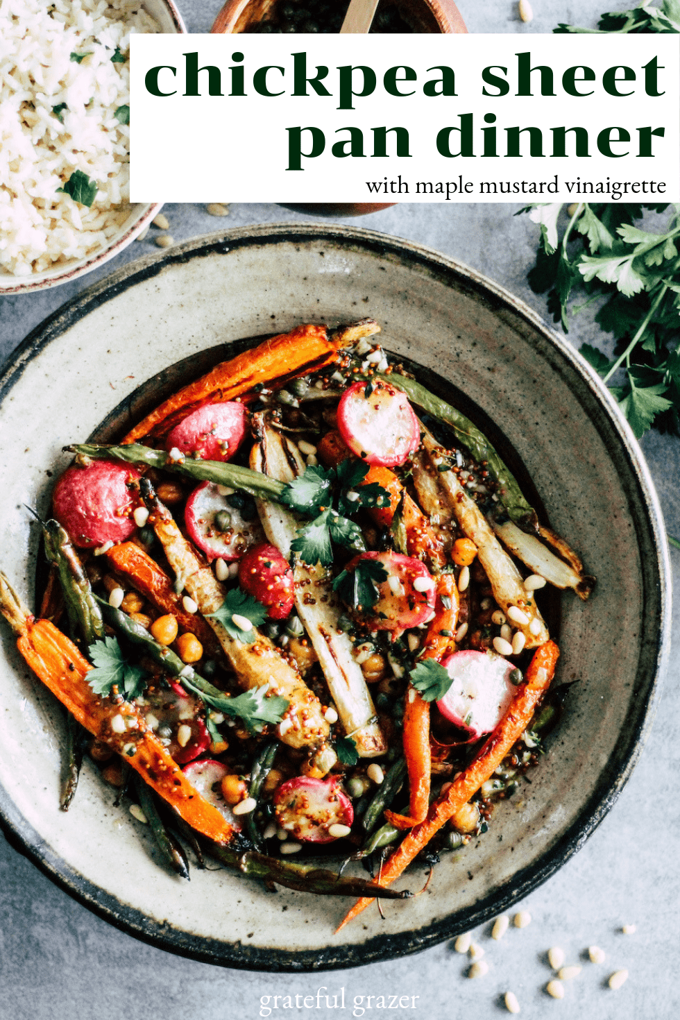 Black text reads, "Chickpea Sheet Pan Dinner with Maple Mustard Vinaigrette," and there is a stone bowl with chickpeas, carrots, green beans, and radish.
