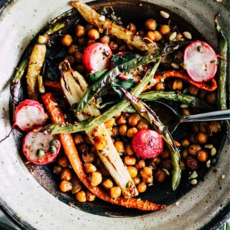 Chickpea sheet pan dinner with vegetables and vinaigrette.