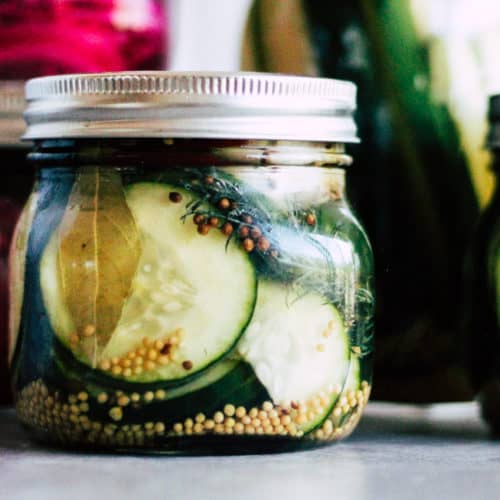 Mason jars filled with quick-pickled vegetables.