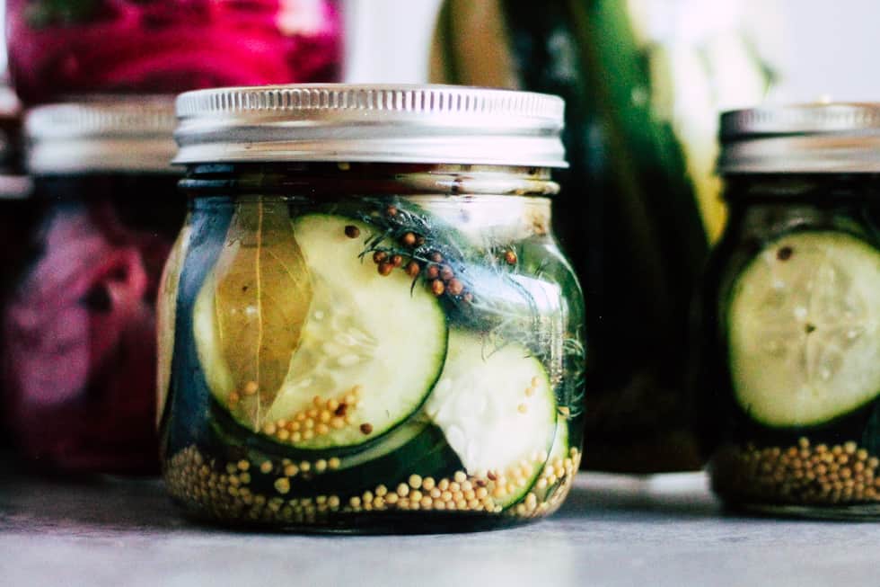 Mason jars filled with quick-pickled vegetables.
