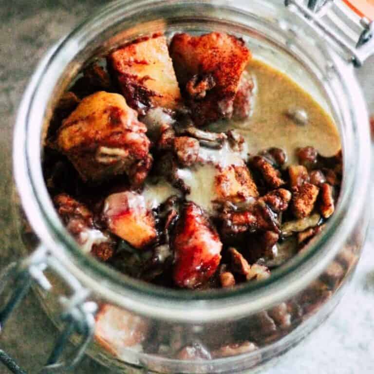 Apple and Pear Overnight Oats in a glass jar.