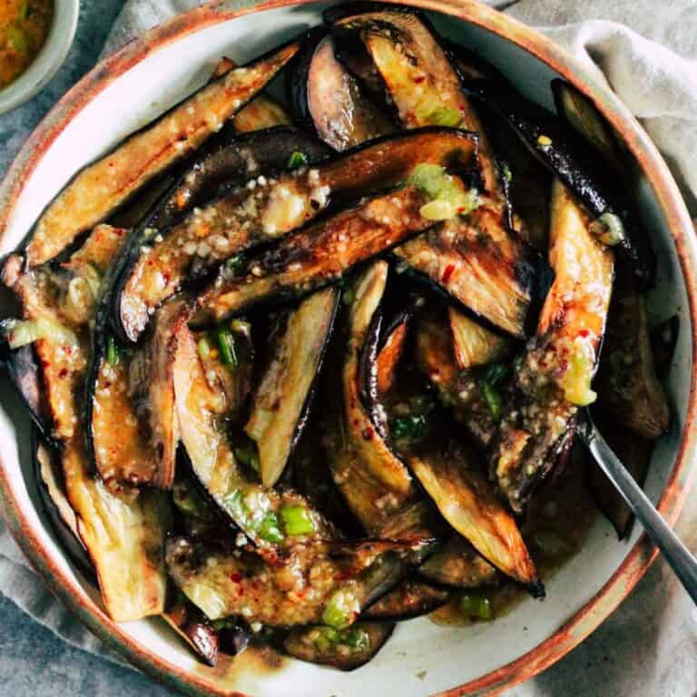Roasted eggplant slices with miso and brown butter.