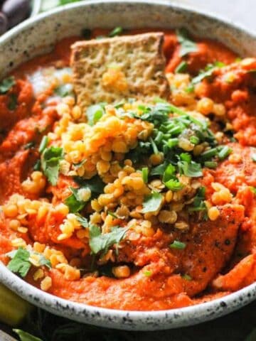 Creamy roasted pepper red lentil dip with herbs.