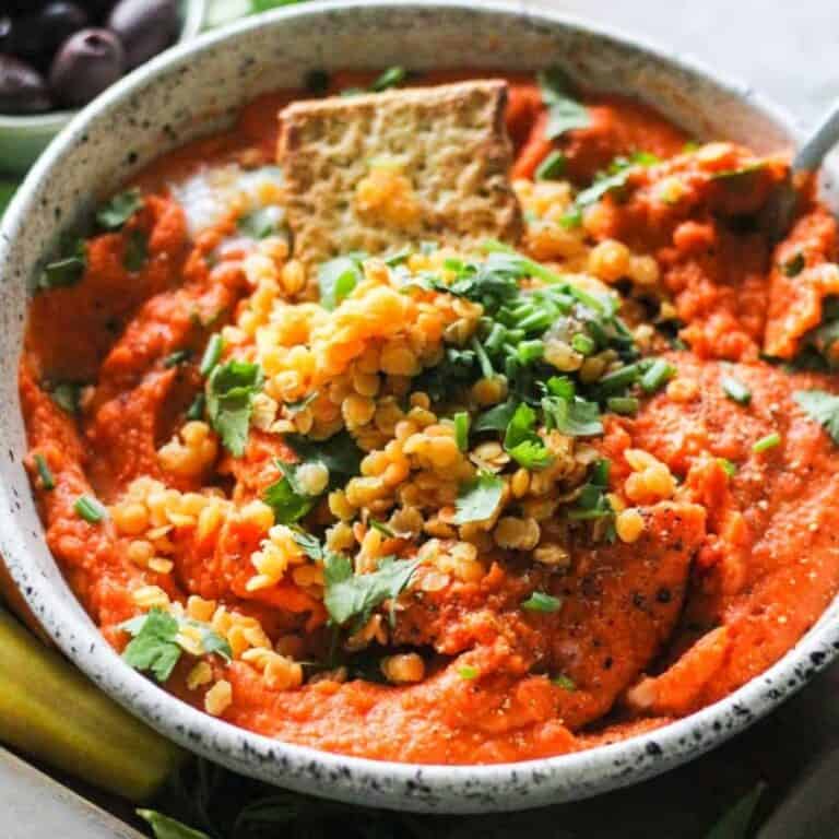 Creamy roasted pepper red lentil dip with herbs.