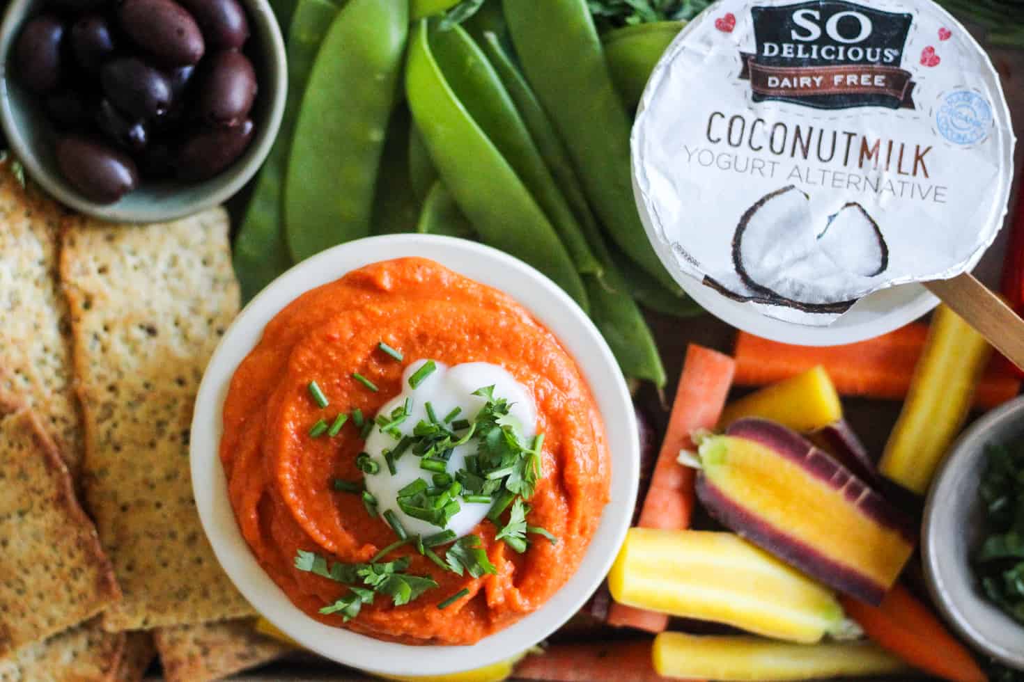 Lentil Dip on party board with So Delicious yogurt.
