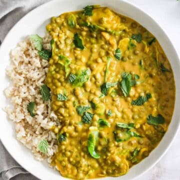 Roasted butternut squash curry with lentils served with rice.