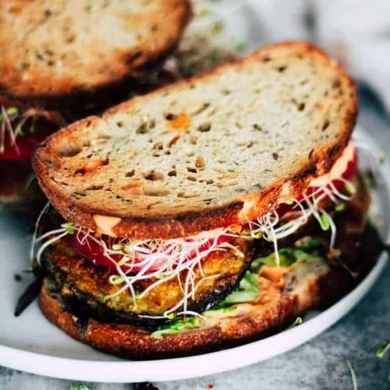 Crispy fried eggplant sandwich with mayo.