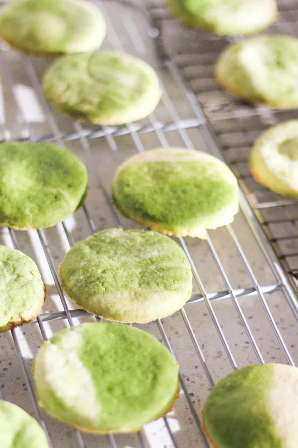 Marbled Matcha Sugar Cookies cooling on white countertop.