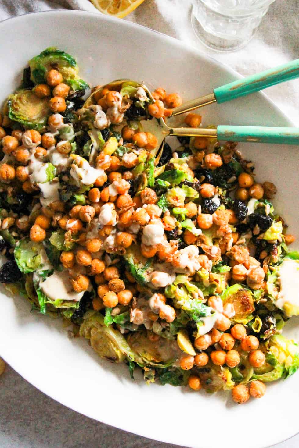 Large salad platter with roasted chickpeas and vegetables.