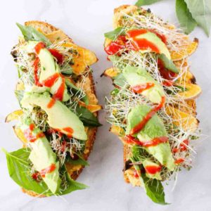 Open face vegetable sandwich as an example of vegetarian lunches to pack for work or school.