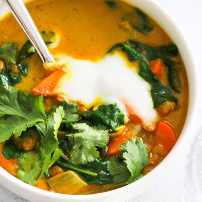 Lentil turmeric soup with vegetables and coconut milk.