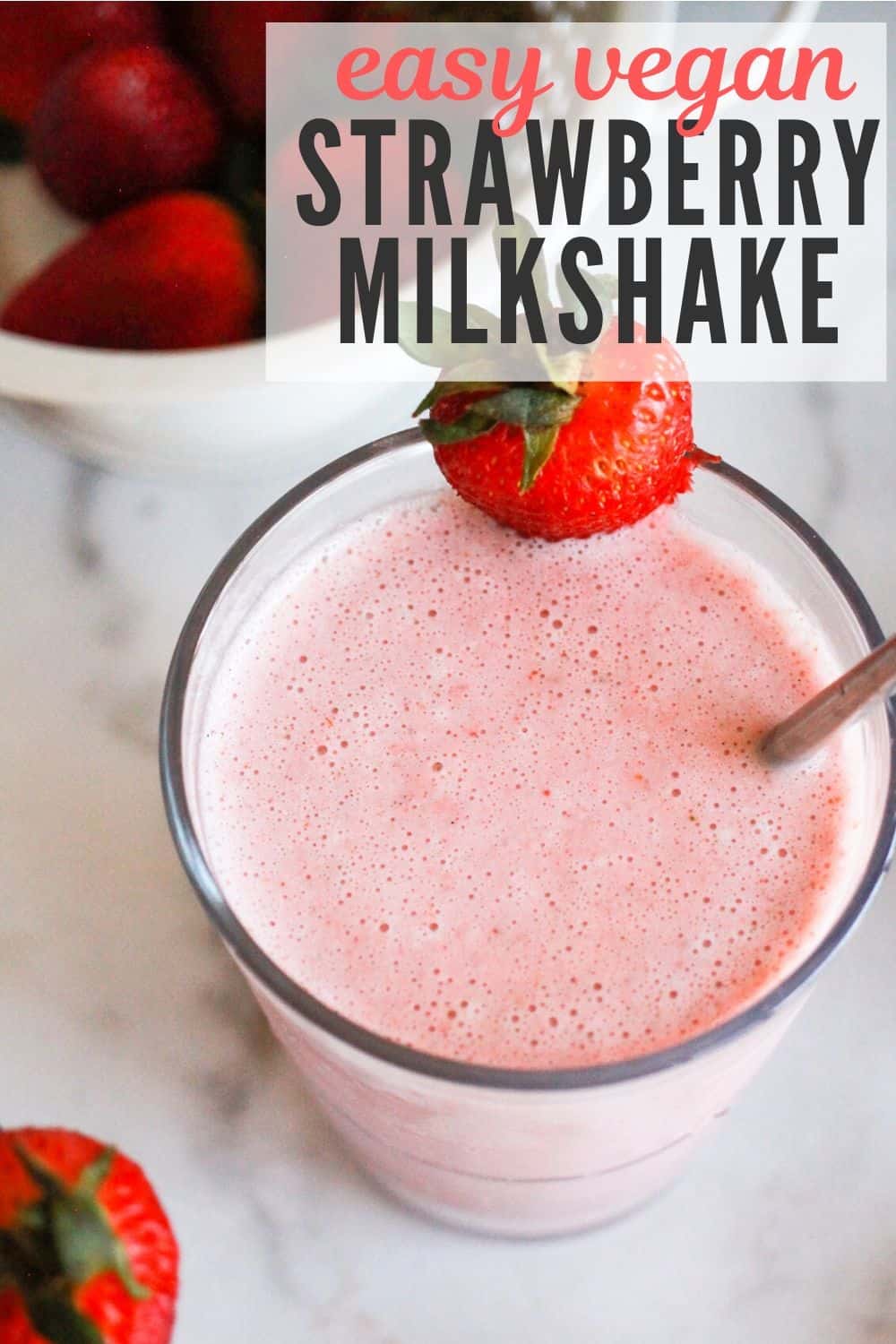 Dairy-free strawberry milkshake in a glass with text reading, "easy vegan strawberry milkshake."