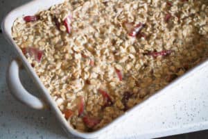Oatmeal in a white baking dish.