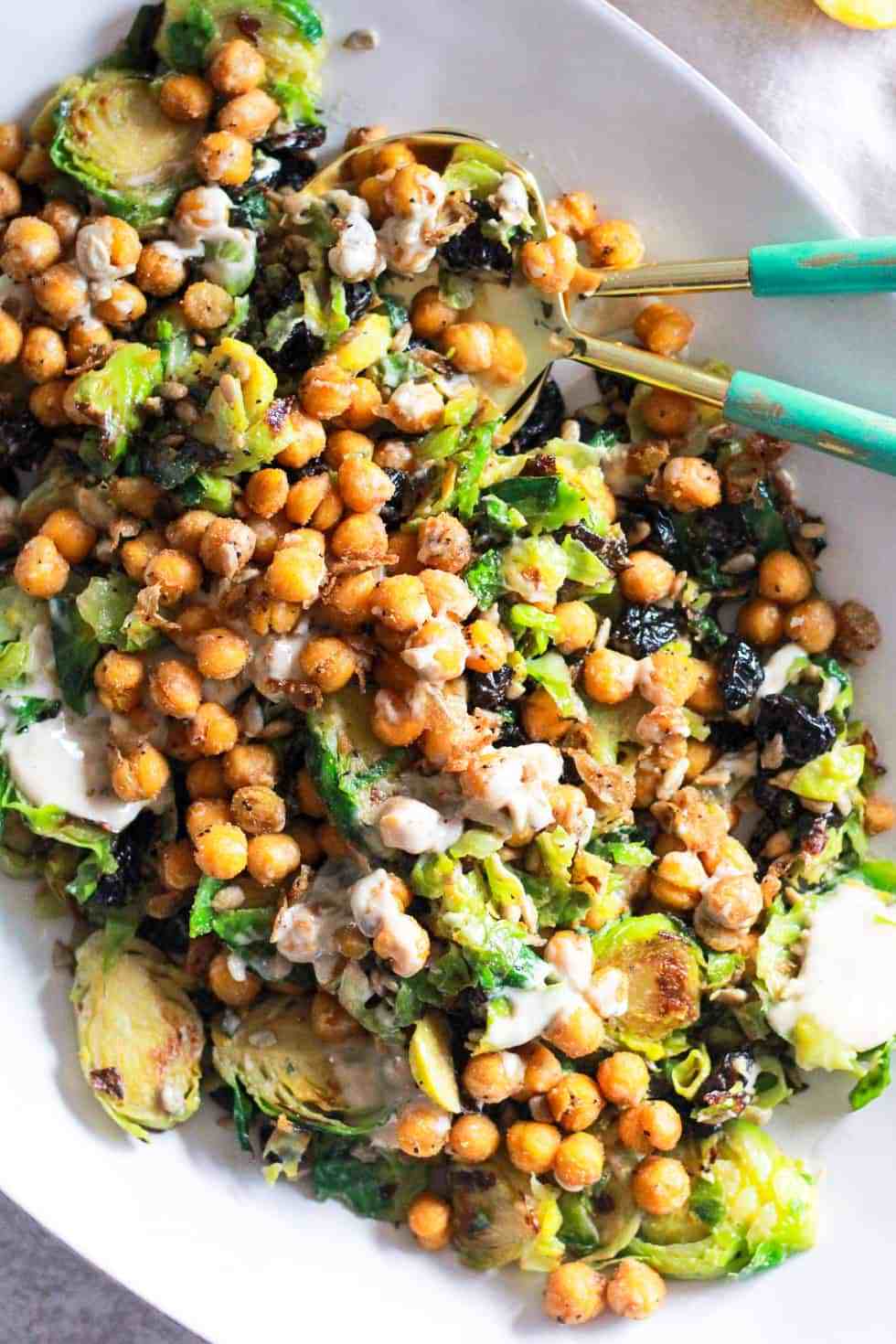 Chickpea salad with brussels sprouts on a white platter is an easy college meal