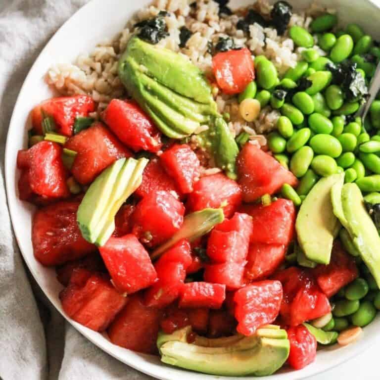 Vegan watermelon poke bowl with edamame, rice, and avocado.