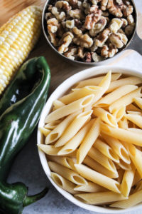 Dry pasta, corn, pepper, and walnuts.