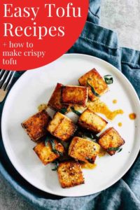 Crispy tofu on a white dish with blue napkin and red and white text that reads "Tofu Recipes and How to Make Crispy Tofu."